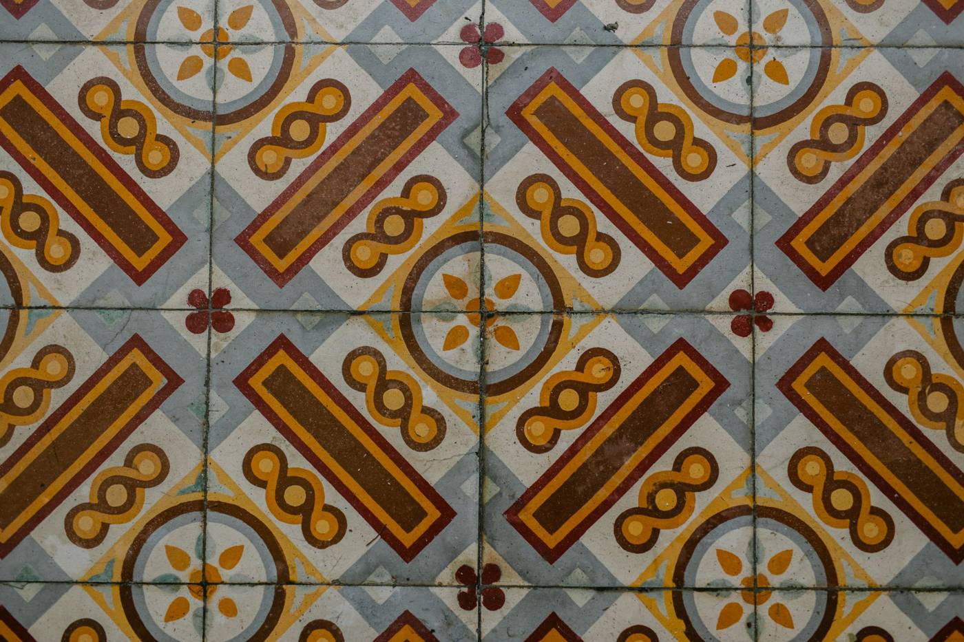 Asbestos floor tiles were common in buildings before the 1980s.